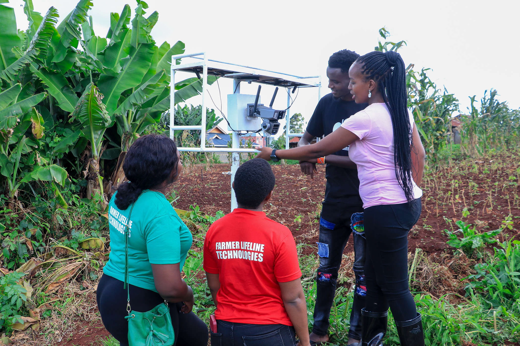 Kimani and her team walk us through the strategic placement of pest-detecting cameras on a Kenyan farm. Image: John Kunga for Global Citizen
