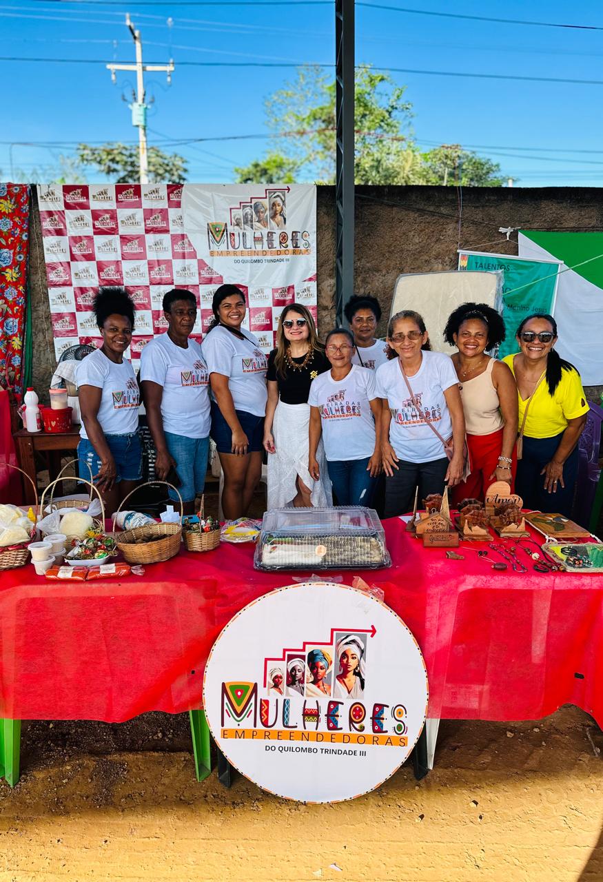 Members of Mulheres Empreendedoras do Quilombo Trindade III showcase locally made products, highlighting how access to finance and markets can strengthen women-led businesses in remote communities. Image: Supplied
