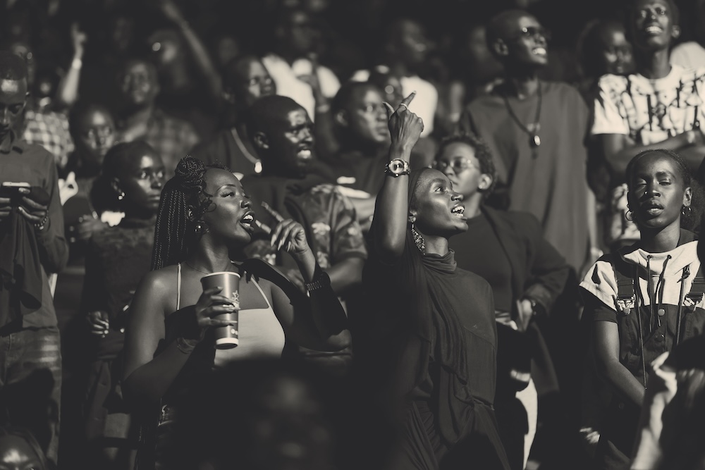 Audience members enjoying a performance at Move Afrika, 2023.