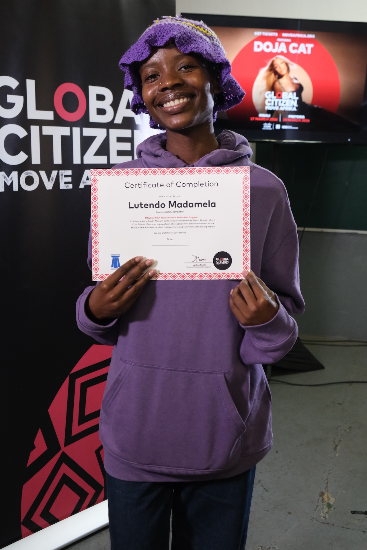 Lutendo Madamela holds a certificate of completion for the Move Afrika Youth Technical Production Program, delivered in partnership with Gearhouse South Africa in March 2026.