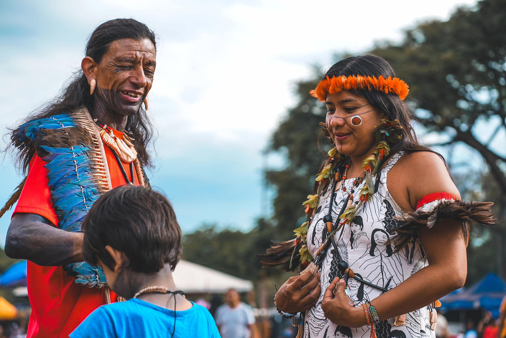 Taily Terena, a 2025 Global Citizen Prize winner and Indigenous climate defender,  has a casual conversation with Terena Nation community members, 2025. | Homero Flávio for Global Citizen.