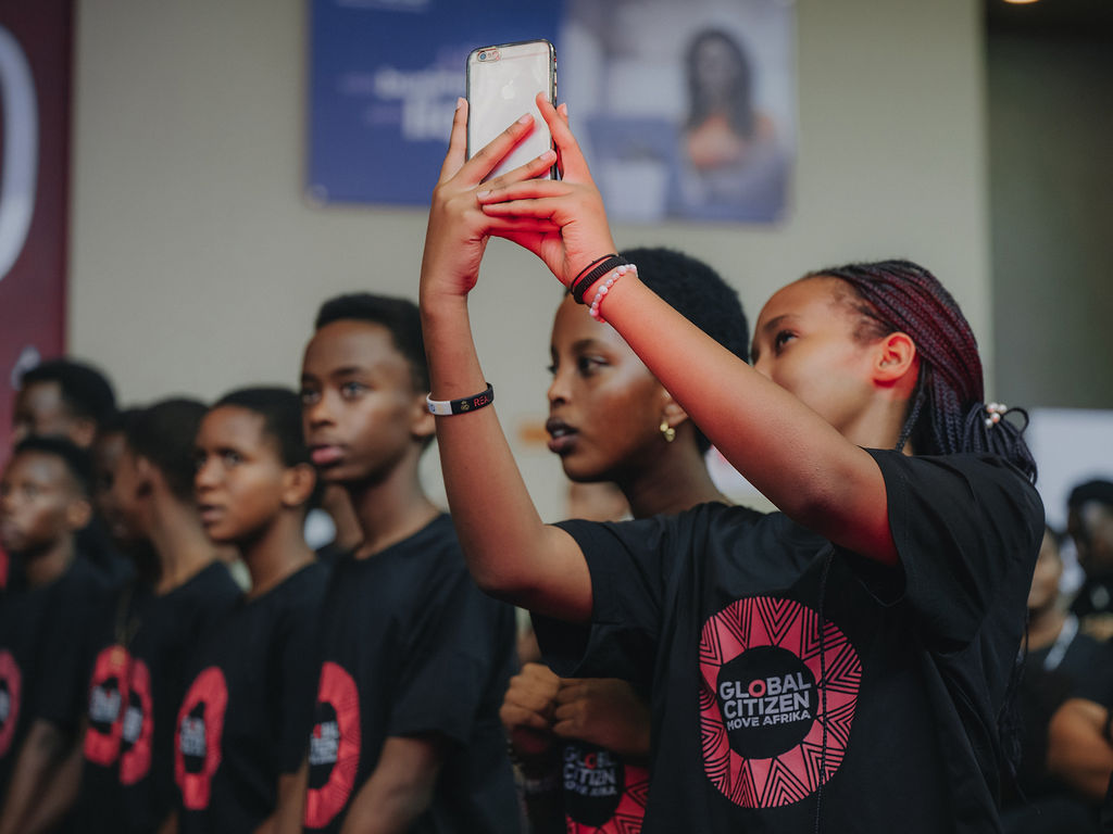 Young participants capture moments during the youth health forum in Kigali. Images: Imagery Flow Creative Studios