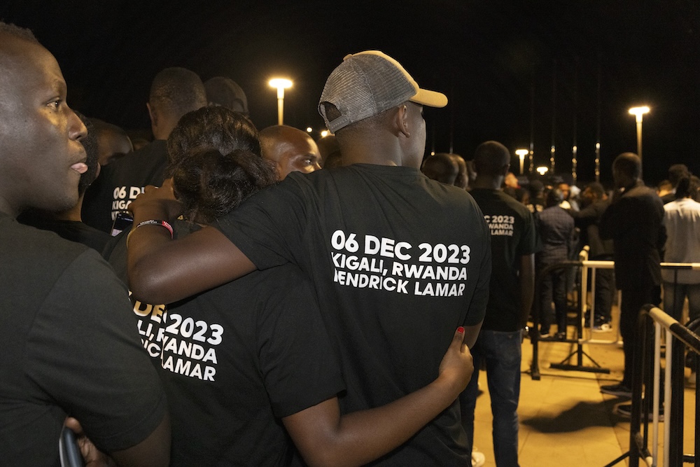 Concert-goers hugging at Move Afrika Rwanda, 2023.