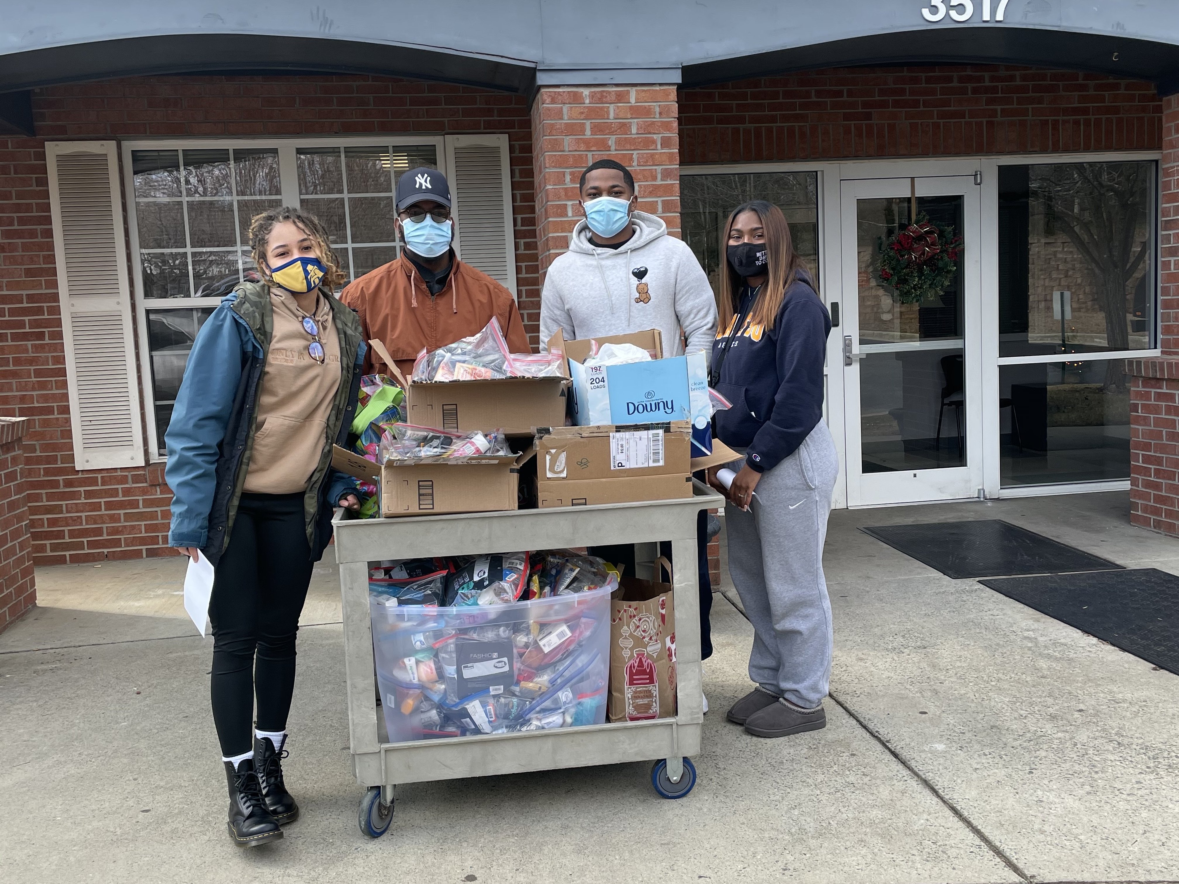 Black Period Project Distributing Menstrual Products.jpeg