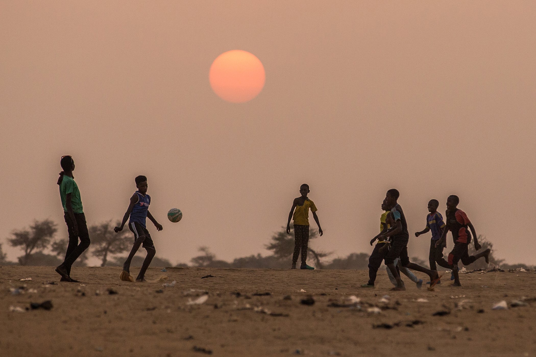 23 Photos of Kids Escaping Places of Crisis by Playing Soccer