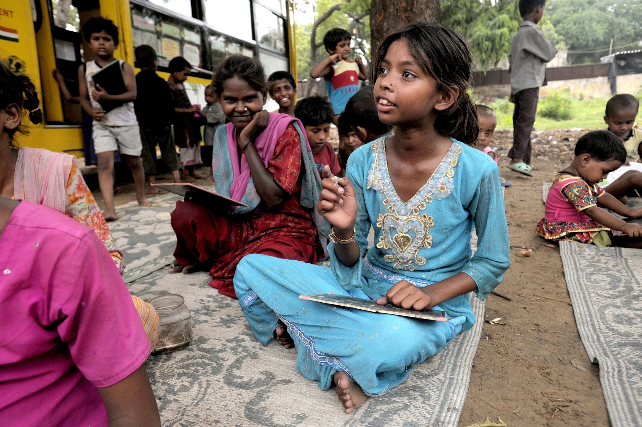 13 Photos of Different Ways Children Learn Around the World