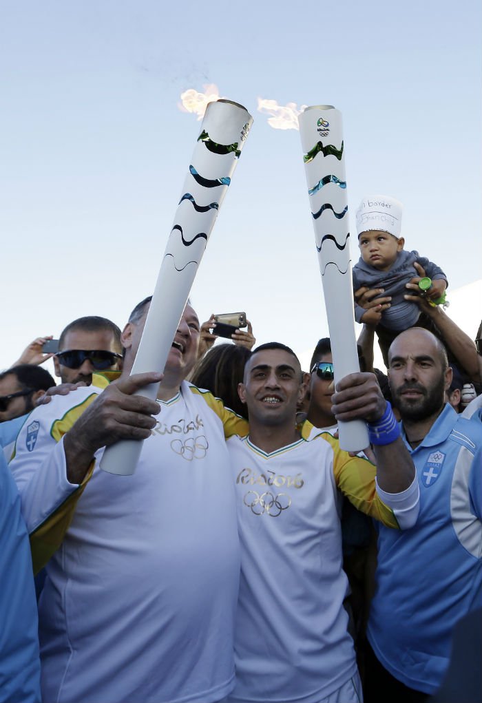 This disabled Syrian athlete just carried the olympic torch through a