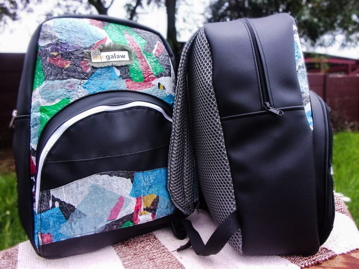 Backpack made with leather and recycled plastics