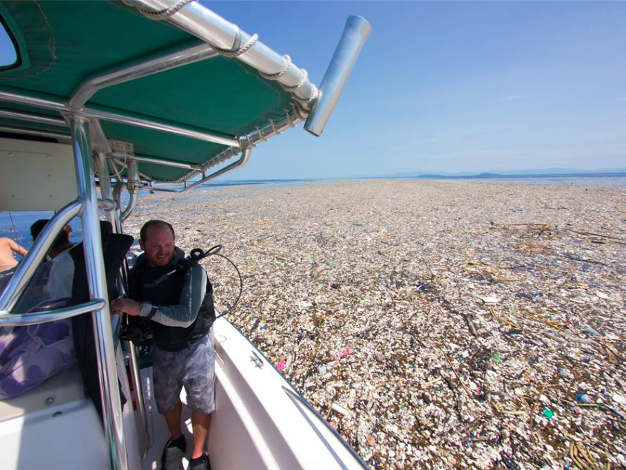 Ship in the waste dump of ocean